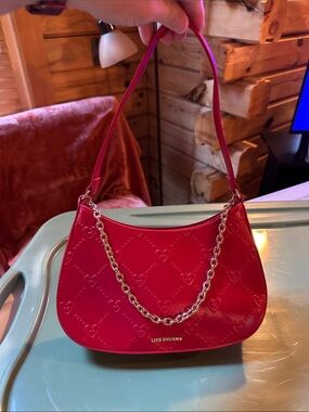 LIKE DREAMS Red Bag with Gold Chain Accent